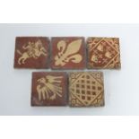 Five late Victorian encaustic floor tiles by W. Godwin, Hereford, each of terracotta ground, with
