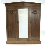 AN ARTS & CRAFTS OAK WARDROBE & MATCHING DRESSING TABLE