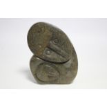 A contemporary Zimbabwean green hardstone sculpture of mother & child, by Zachariah Njobo; 7" high.