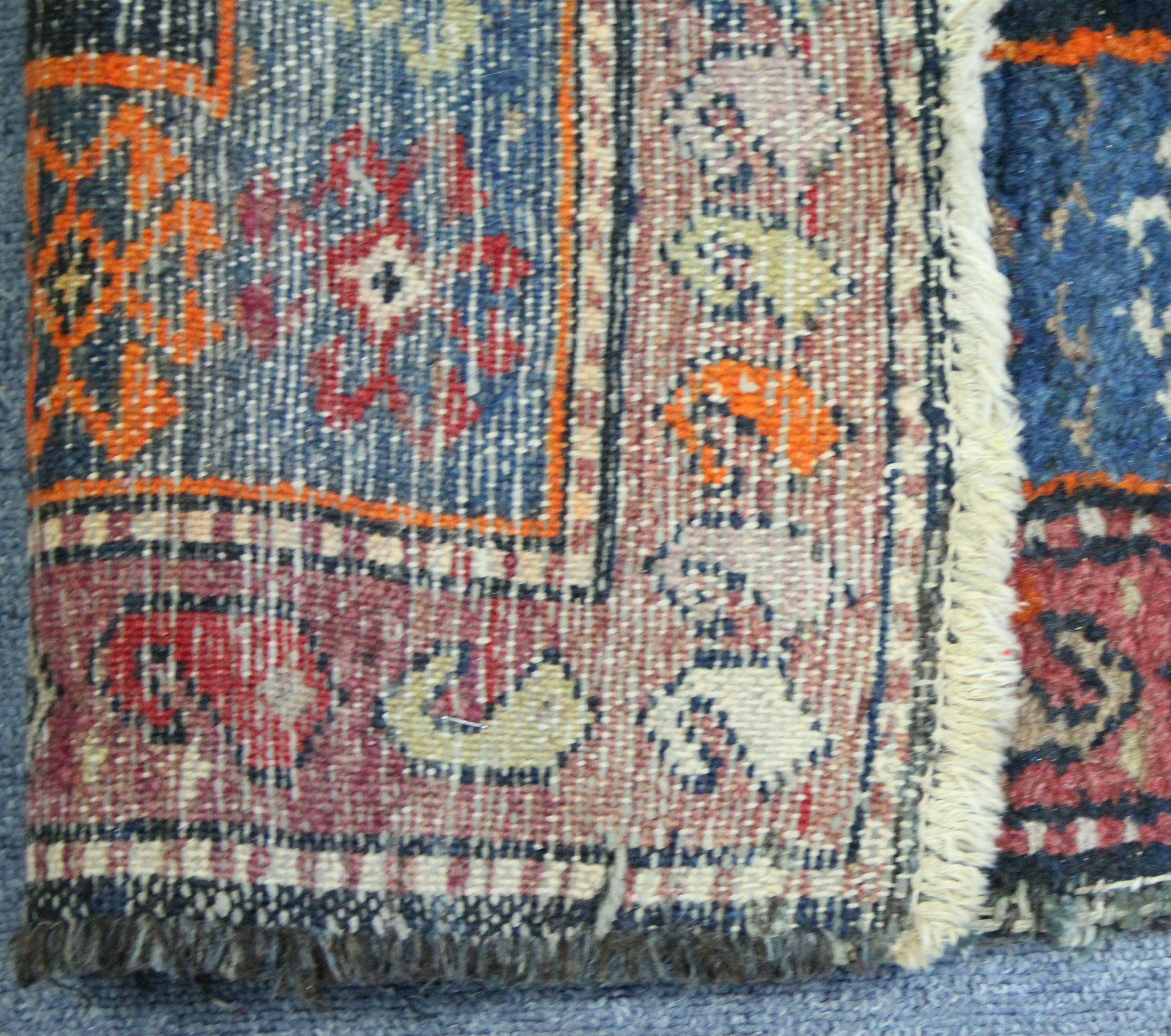 A Persian rug of deep blue ground with bold rust-red geometric pattern forming two rectangular - Image 2 of 2