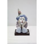 A Lladro porcelain large ornament titled: “Clown’s Head” (No. 5129), with base.