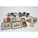 A silver plated oval biscuit box, three pewter tankards, two small black and white prints and sundry