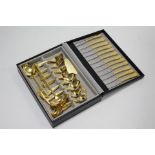A Martver Goldet sixty-three piece cutlery set (settings for twelve), stamped “23/24 karat”, in