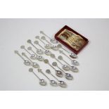 A set of six Boliden silver coffee spoons with fancy terminals, cased; together with eighteen