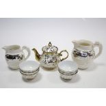 Two Wedgwood white glazed & silver overlaid jugs, each with raised hunting-scene design & with