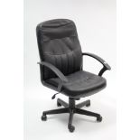 A black leatherette swivel office chair.