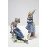 Two Lladro Daisa large porcelain musician figures, 13¾” & 10¼” high.