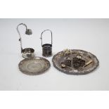 Four various silver napkin rings; a silver plated bottle holder; & various other items of