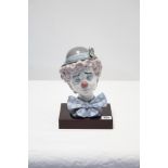 A Lladro porcelain large ornament titled: “Sad Clown” (No. 5611), with base.