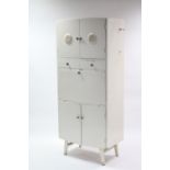 A mid-20th century Esto white painted wooden tall kitchen cabinet fitted two small drawers to centre