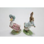 Two Royal Albert Beatrix Potter character figures: “Jemima Puddleduck”, & “Peter Rabbit”.