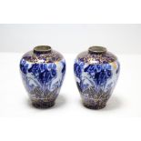 A pair of late 19th/early 20th century Wedgwood semi porcelain “Iris” pattern ovoid vases, 6¼”