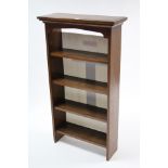 A small oak standing four-tier open bookcase, 26½” wide x 47” high.