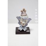 A Lladro porcelain large ornament titled: “Reflecting” (No. 5612), with stand.