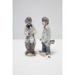 Two Lladro porcelain clown figures titled: “Circus Sam” (No. 5472), & “Sad Sax” (No. 5471).