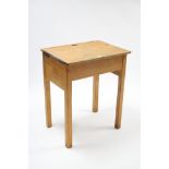 A wooden school desk with hinged top, and on square legs, 24” wide x 30” high