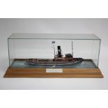 A painted wooden scale model of the steamboat “Seaway of Ardrossan”, in glazed case, 20” wide.