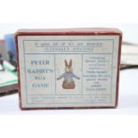 An early 20th century Frederick Warne & Co. “Peter Rabbit’s Race Game” with four cast-metal