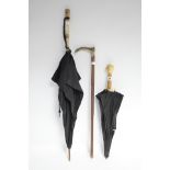 A gent’s umbrella with ivorine handle in the form of two parrots heads (w.a.f.); together with