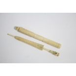 An ivory cylindrical needle case Stanhope with views of “Bath From Evans & Owen”, 4” long; & an