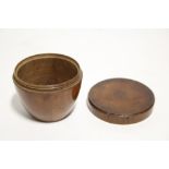 A 19th century pear-wood box of ovoid shape, with flat screw cover; 3¼” diam. x 2½” high. (Slight