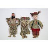 A late 19th/early 20th century composition Chinese doll with painted features, 10” high; & a pair of