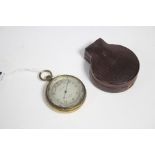 A late 19th/early 20th century compensated pocket barometer, the silvered dial signed “Short & Mason