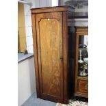 A mahogany narrow wardrobe enclosed by panel door, 27¾” wide x 6ft 1“ high.