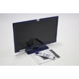 A Logik 24” HD Ready LED television with built-in DVD player, with remote control, w.o.