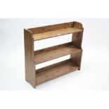 A pine standing three-tier open bookcase, 36½” wide x 31¾” high.