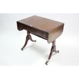 A reproduction mahogany sofa table fitted two frieze drawers, & on square end supports with splay