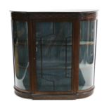 A 19th century-style mahogany standing break-front china display cabinet with blind fret-work