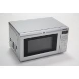 A Panasonic 700W microwave oven in silvered-finish case, w.o.