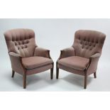 A pair of Parker Knoll buttoned-back easy chairs upholstered pink velour (faded).