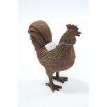 A modern cast-iron “hen” ornament, 12¼” high.