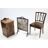 A Victorian walnut bedside cabinet enclosed by carved panel door, & on shaped plinth base, 15” wide;