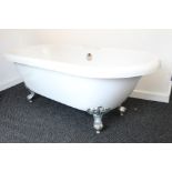 A Victorian style white finish free standing bath tub, on silvered metal cabriole legs & claw-&-ball