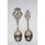 Two late 19th century Dutch spoons with oval bowls, each with cast stem & terminal decorated with