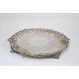 A Victorian salver, the raised & shaped border with cast flowers & leaf scrolls, contemporary