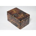 A Japanese tortoiseshell veneered & lacquer decorated two division tea caddy; 9” wide. (w.a.f.).