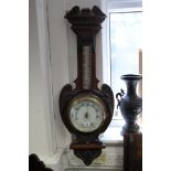 A late 19th century aneroid wall barometer & thermometer, in carved walnut banjo-style case; 37½”