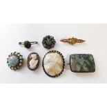 A 9ct. gold bar brooch; a scarab-shell brooch; a moss agate brooch; a cast & pierced silver brooch