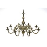 A brass eight-branch chandelier in the 17th century Dutch style; 32” wide x 25” high.