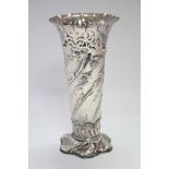 A late Victorian tall tapered flower vase with pierced rim & floral-embossed spiral fluting, on