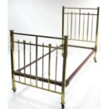 A late Victorian all-brass single bedstead; 36” wide.