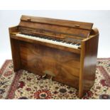 AN EAVESTAFF “ROYAL” MINIPIANO in figured walnut case, with over-strung iron frame, instrument No.