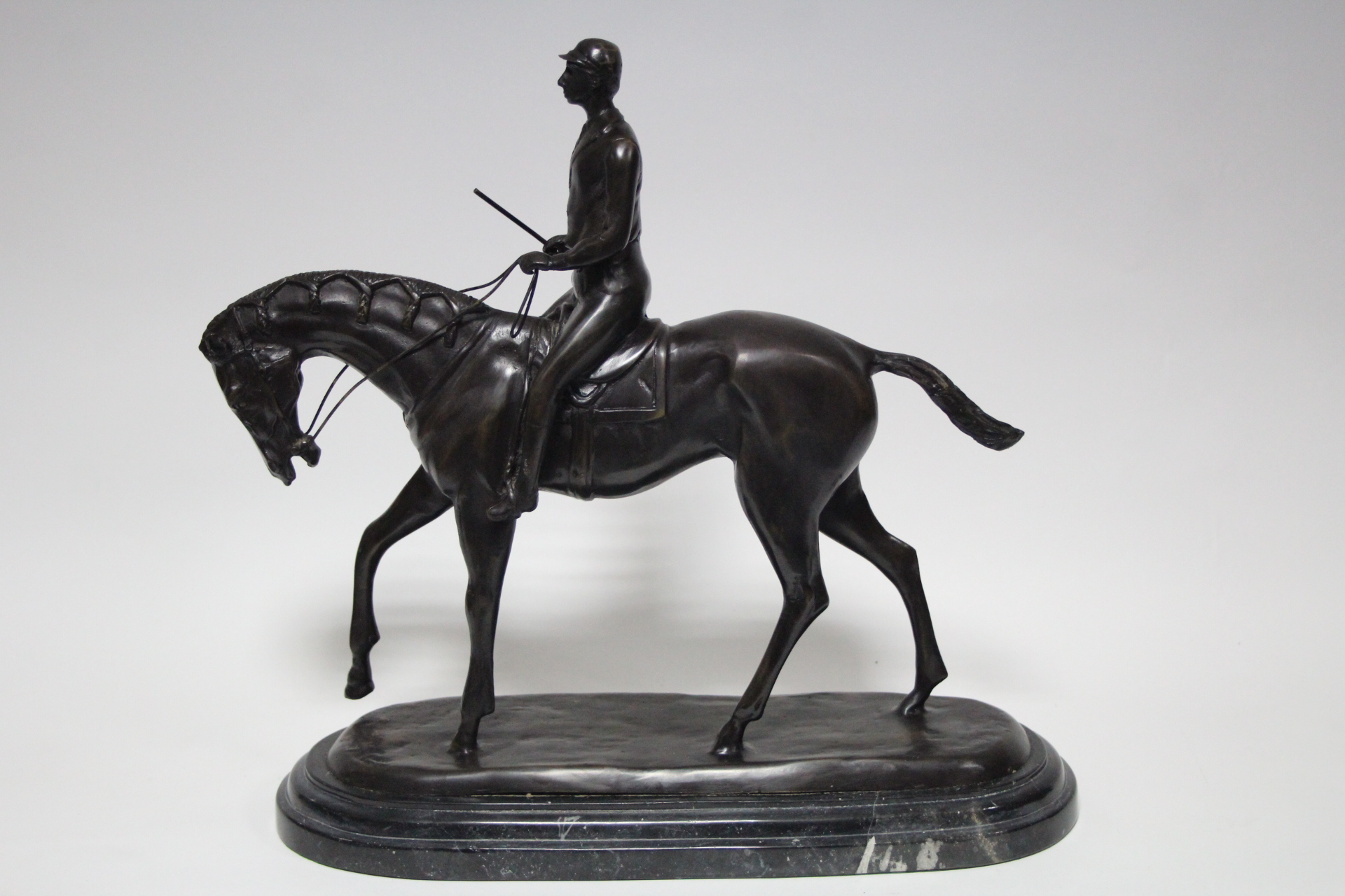 BONHEUR (after). A bronze sculpture of a racehorse with jockey up; 14” high x 14” wide. - Image 3 of 3