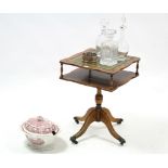 A reproduction yew wood occasional table inset gilt-tooled leather to the square top, & on vase-