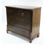 A Georgian mahogany chest fitted two short & three long graduated drawers with brass swan-neck