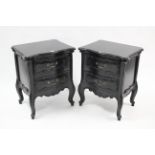 A pair of black-finish bedside chests in the continental style, each fitted two long drawers, & on